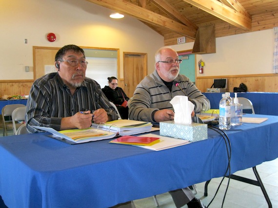 Bob St. Eloi, right, director of finance for the Qikiqtani Inuit Association, presents the association’s budget at the board’s spring meeting with secretary-treasurer Joe Ataguttaaluk, June 4 at the Anglican Parish Hall in Iqaluit. St. Eloi said he expects a surplus this year, which will be a “dramatic improvement” over last year’s $1.6 million deficit. The spring meeting runs June 3 to June 8. (PHOTO PETER VARGA)