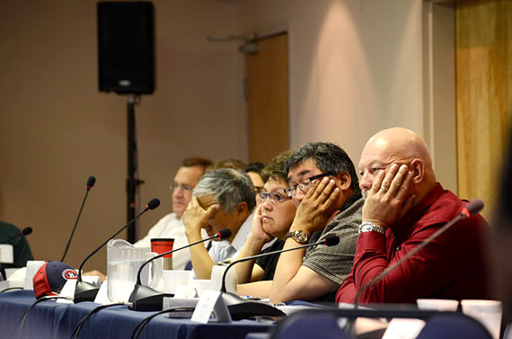 Glen Williams, right, listens to delegates at the Baffin caribou workshop July 24 at the Navigator Inn in Iqaluit. (PHOTO BY DAVID MURPHY)