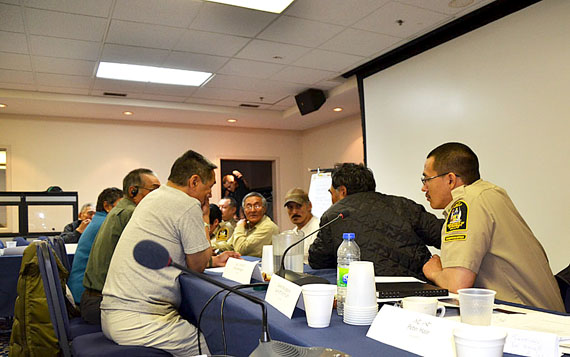 Delegates at the Baffin caribou workshop, including HTO members and conservation officers, discuss possible solutions for Baffin caribou populations July 24 at the Navigator Inn. in Iqaluit. (PHOTO BY DAVID MURPHY)