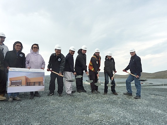 Officials from Hydro-Québec and Nunavik gather Aug. 1 in Akulivik to hold the ground-breaking for a new $49.4 million power plant in the community — whose seen to the left of the photo. (HANDOUT PHOTO)