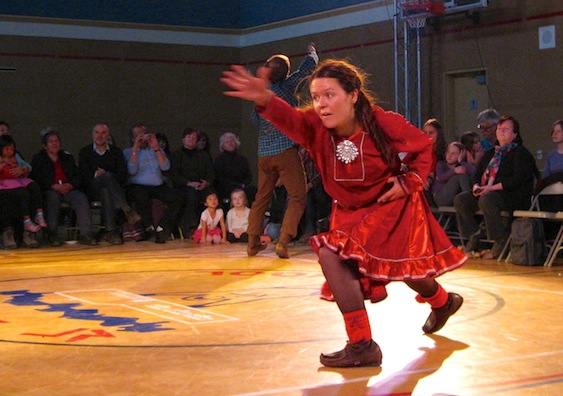 Elle Sofe Henriksen of Norway performs Jorggáhallan with Thomas Gundersen, in the background, at Joamie Elementary School in Iqaluit Sept. 21. The dance piece grew out of knowledge Henriksen collected from elders in Sápmi, the Saami region of northern Europe.