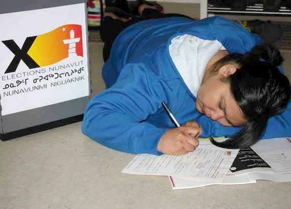 Registering to vote: Nunavut Sivuniksavut student Kathryn Misheralak of Rankin Inlet fills out an application to get on the voters list for the Oct. 28 Nunavut election. Sandy Kusugak, Nunavut's chief electoral officer, briefed students this week on what they need to do to vote when the'rere in the South attending school. NS students, who are 18 or older on Oct. 28, may vote by special ballot in their home constituency, but they must first apply to Elections Nunavut. (PHOTO COURTESY OF NS)
