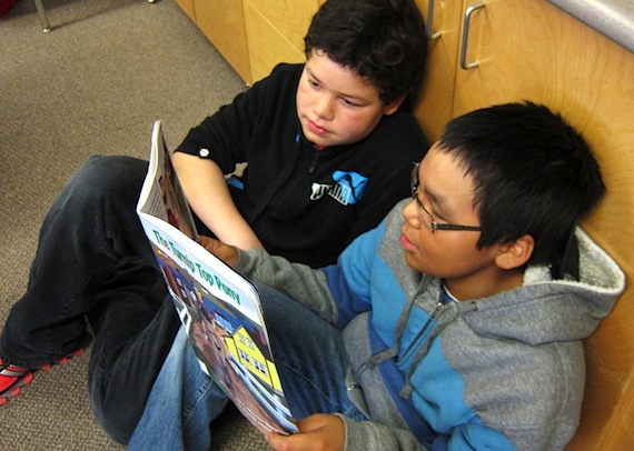Rankin Inlet reads for 15: Grade 8 students from Manni Ulujuk School join Grade 6 students from Simon Alaittuq School to 