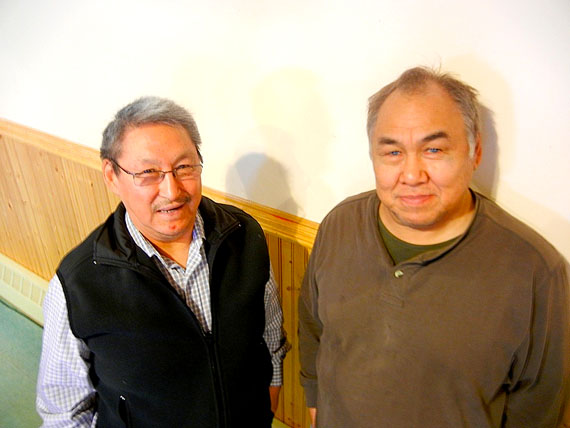 George Eckalook, the former vice-president of the Qikiqtani Inuit Association, and Larry Audlaluk, the new interim QIA vice-president, pose together at an earlier QIA board meeting. (FILE PHOTO)