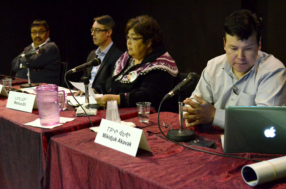 The four people contesting the Iqaluit-Manirajak seat in the Oct. 28 Nunavut election — from left, Paulie Sammurtok, Lewis Lehman, Monica Ell and Mikidjuk Akavak — take questions from voters at a candidates forum that started at 12 noon Oct. 26 inside the Iqaluit francophone centre. Residents who can't make it to the event may listen to a live broadcast on CFRT at 107.3 on the FM band. The riding-by-riding forum will continue until 5:45 p.m. (PHOTO BY JIM BELL)