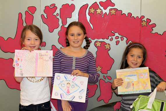 Nunavut Literacy Week poster contest winners at Joamie Elementary School in Iqaluit: Tenesha Dean, Lena Chown, and Cynthia Joanasie. The poster competition was just one of the school's event held during Nunavut Literacy Week, Sept. 22 to Sept. 28. (PHOTO COURTESY OF SONJA LEBLANC)
