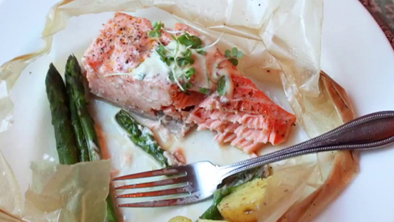Arctic Char in parchment paper cooks fish and any other vegetables encased in an air-tight shell. (IMAGE COURTESY OF FOODWISHES.COM)