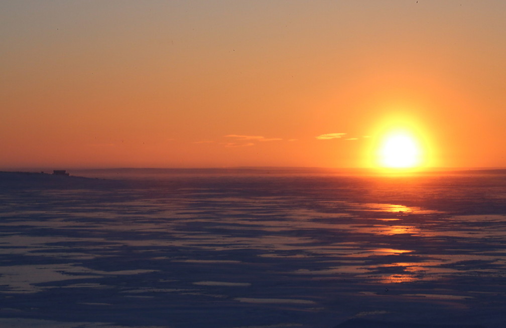 Welcome back: the full sun appears over Cambridge Bay at 12:10 p.m., Jan. 16. It may have been -35 Celsius (-48 C with the wind chill) but the sun's rays provided at least a sense of possible spring. (PHOTO BY RED SUN PRODUCTIONS)