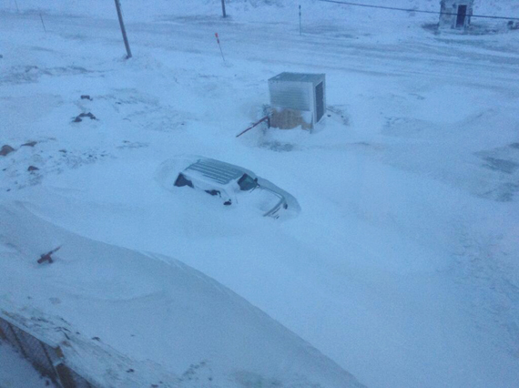 Residents of Iqaluit woke up Jan.8 to downed power lines, debris and giant snow drifts like this photo taken in Iqaluit's Plateau neighbourhood, the morning after the centre of a violent blizzard blew through the southern Baffin region. Environment Canada recorded peak wind gusts of 135 km/h in Iqaluit Jan. 7, one of the highest sustained winds ever registered in Nunavut's capital. Weather warnings have ended in Iqaluit, although blizzard conditions continue through central Nunavut and most of the Nunavik region until Jan. 9. (PHOTO BY KENNY BELL)