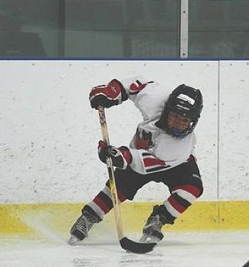 Atiqtalaaq Uuttuvak, 8, is averaging a goal a game in his Ottawa Novice hockey league. Now he wants to go to Europe to play hockey in a tournament there — but he needs a little help. (PHOTO COURTESY OF ANITA UUTTUVAK)