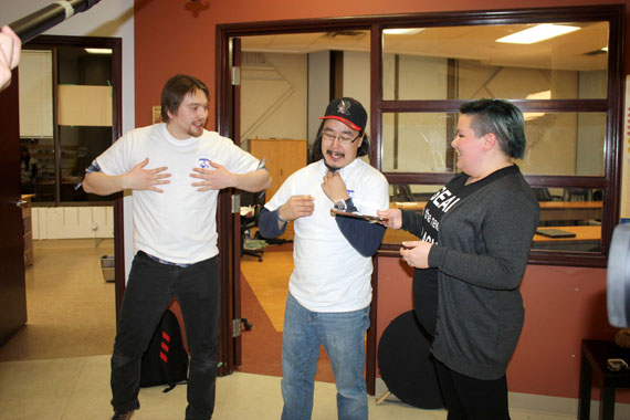 Nunavut Sivuniksavut instructor Becky Mearns joins the fun during a recent live broadcast and taping of the APTN comedy show Qanurli at the NS school in Ottawa. Inuk Qablunaaq (Thomas Anguti Johnston), left, graduated from NS in 2006 and his sidekick Nipangi (Vinnie Karetak) graduated in 1998. (PHOTO COURTESY OF NS)