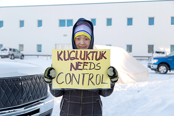 Kugluktuk high school student Savanah Egotak makes her opinion clear on the proposed elimination of alcohol restrictions in Kugluktuk, during a Feb. 20 march held by about 30 students. On Feb. 24, 230 voters in Kugluktuk said no to the proposal, while only 180 said yes, which means that the current restrictions will remain. (PHOTO BY JESSE AJAYI)
