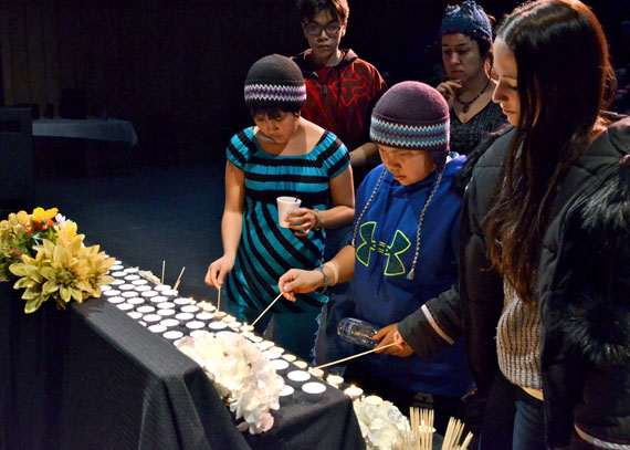 Kuujjuamiut mark Quebec's Suicide Prevention Week at Katittavik Town Hall Feb. 8 by lighting candles in memory of those they have lost. Earlier that afternoon they held a walk through Kuujjuaq that started at Jaanimmarik School at 1:30 p.m. to raise awareness about suicide prevention. At the town hall, free hugs were distributed, and local singer Etua Snowball sang in Inuktitut. Other activities took place all week at Jaanimmarik School. Quebec's Suicide Prevention Week ran Feb. 2 to Feb. 8. (PHOTO BY ISABELLE DUBOIS)