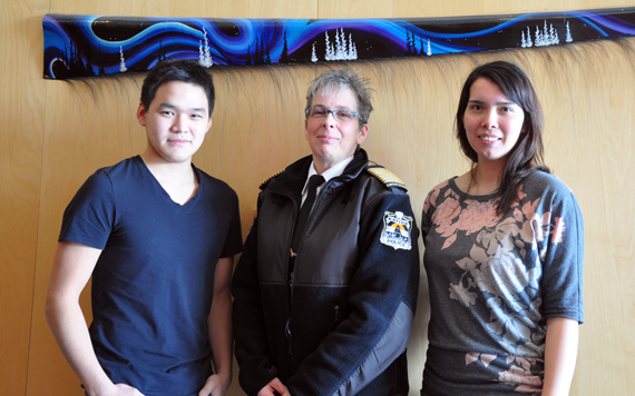 Kativik Regional Police Force chief Aileen MacKinnon, centre, poses with her newest staff members; Anthony Arreak, left, the force's new public relations and community liaison worker, and Tracy Partridge, its new crime prevention officer. Both Kuujjuaq-based staffers were hired in January, to help grow the KRPF's presence in communities across Nunavik. (PHOTO BY SARAH ROGERS) 