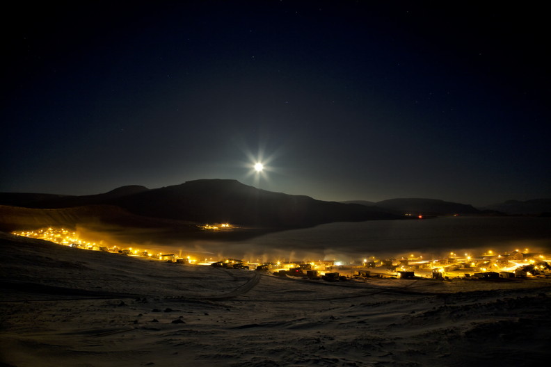 Moon rise over Arctic Bay: Award-winning Nunavut photographer Clare Kines captured this stunning night-time scene Feb. 15 at around 8:30 p.m. from his perch above town just off the Victor Bay road. He said the temperature was around -38 Celsius which brought about an eerie ice fog in town. If you want to see more of Kines' photography, visit his Flickr site at http://tinyurl.com/p2mn8wc. (PHOTO BY CLARE KINES)