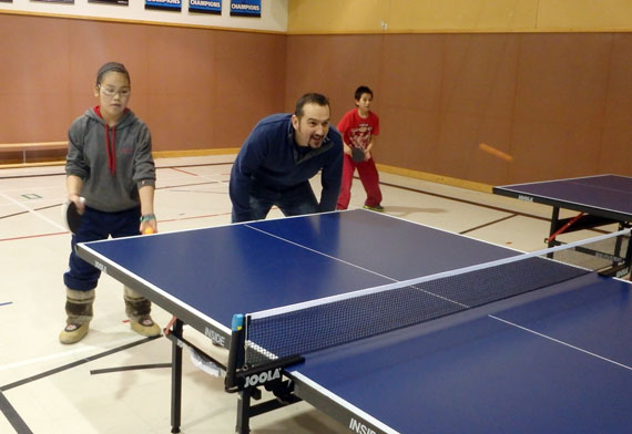 Kangiqsualujjuaq student Manumie Annanack, 13, gets some last minute table tennis practice alongside her coach Gary Thibault March 11. Annanack is one of about 60 athletes who make up Team Nunavik-Québec, which leaves March 14 to participate in this year`s Arctic Winter Games, being hosted in Fairbanks, Alaska. (PHOTO BY GILLIAN WARNER)