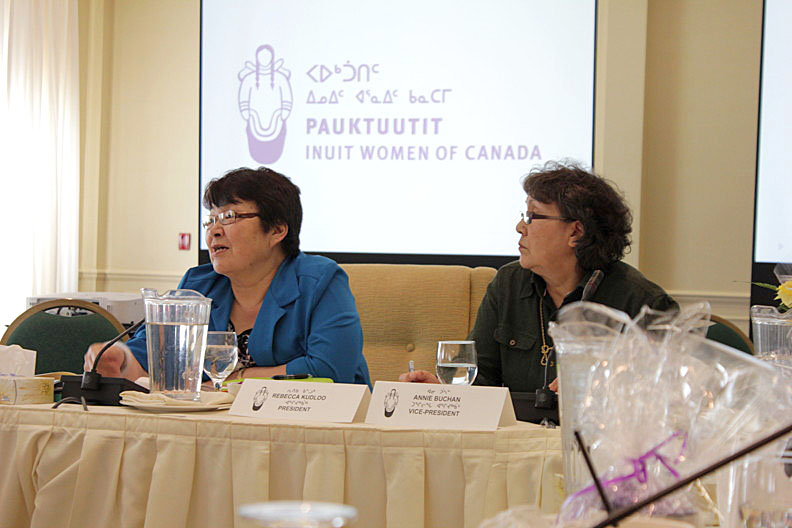 After hearing reports from regional representatives around the table March 13, the last day of the Pauktuutit annual general meeting, Rebecca Kudloo, Pauktuutit president, left, encouraged delegates to lobby local, territorial and federal representatives to fund women's programs, since women's health directly affects the health of families. Regional representatives from around Inuit Nunangat said many social ills in their communities — family violence, addiction, mental health problems — can be traced back to residential school abuse and the pain that victims have passed down to their children. Read more about the Pauktuutit AGM later on nunatsiaqonline.com (PHOTO BY LISA GREGOIRE)