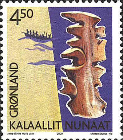 A wooden map displayed on a Greenlandic stamp. (HARPER COLLECTION)