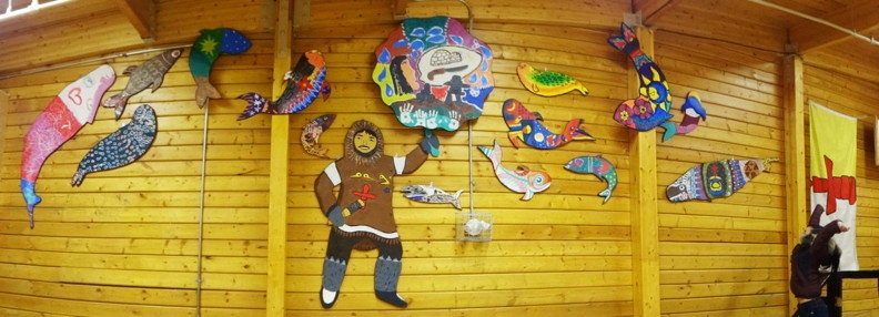 Arviat's completed mural in the town's community hall. (PHOTO BY PASCALE ARPIN)