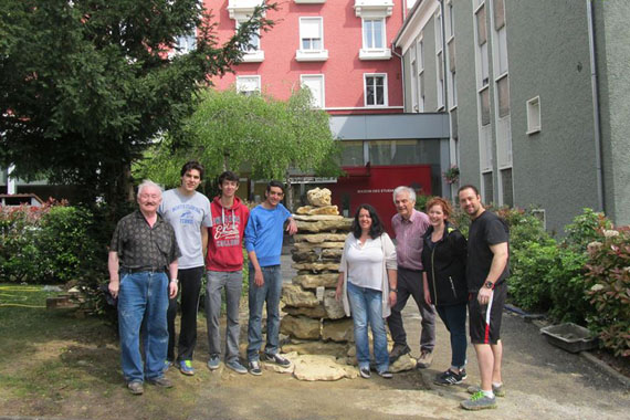 Nunavut elder and cultural activist Piita Irniq, far left, poses with a group of Canadians outside the Maison des Etudiants Canadiens in Paris, France this week, where the group built its very own inuksuk on the centre's grounds. The Maison des Etudiants Canadiens (House of Canadian Students) hosts Canadian students, researchers and artists working in France's capital city. The residence plans to officially unveil its new Inuit marker April 25. (PHOTO COURTESY OF PIITA IRNIQ) 