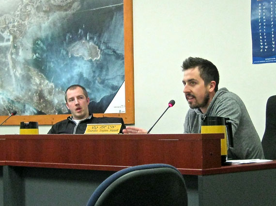 Joel Fortier describes his trouble with the city’s sewer lines to Iqaluit city council and the city’s director of public works, May 20. City councillor Kenny Bell looks on. Public works director Keith Couture said that much of Iqaluit's sewer system was constructed with no quality controls and that in the lines in Happy Valley 