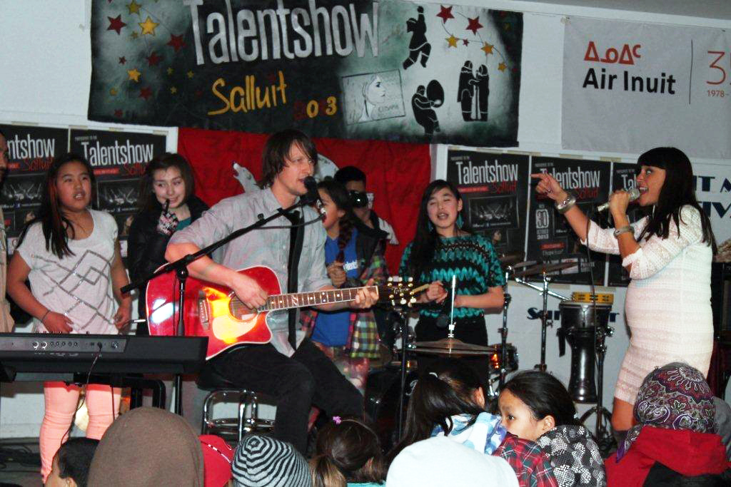 Elisapie Isaac, far right, performs Oct. 30 at Talentshow Salluit alongside guitarist Manuel Gasse and local musicians Stella Sakiagak, Tanya Genest, Mary Argun and Betsy Koperqualuk. Youth Fusion is helping put on a regional talentshow in Salluit later this year. (FILE PHOTO)