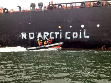 Activists on board the Rainbow Warrior III attempted to stop a Gazprom tanker from docking at Rotterdam harbour May 1. (GREENPEACE PHOTO)