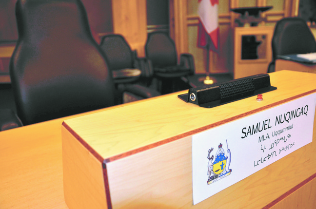 Uqqummiut MLA Samuel Nuqingaq's empty chair when he was absent from MLA orientation shortly after he was elected: Clyde River Mayor Jerry Natanine says his community needs proper representation. (FILE PHOTO)