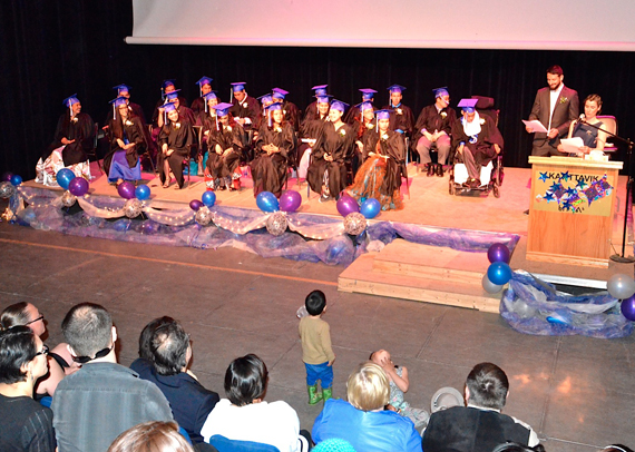 Jaanimmarik high school teachers Véronique Gilbert and Manuel Lefevbre, left, congratulate this year's 22 graduates during a June 11 ceremony at Kuujjuaq's Katittavik town hall. (PHOTO BY ISABELLE DUBOIS) 