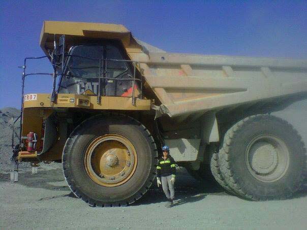 Alma Itkilik, a haul truck driver from Baker Lake, stands next to her haul truck at Meadowbank. (PHOTO COURTESY OF ALMA ITKILIK)