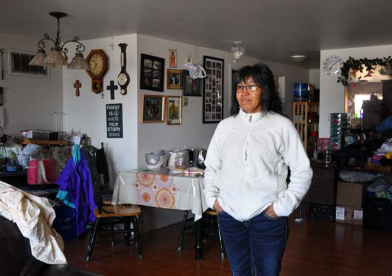 Hannah Pilakapsi in her Rankin Inlet home. The heavy equipment operator at Meadowbank now trains and coaches new haul truck operators at the mine. Agnico Eagle says her positive leadership has helped inspire new employees. (PHOTO BY SARAH ROGERS)