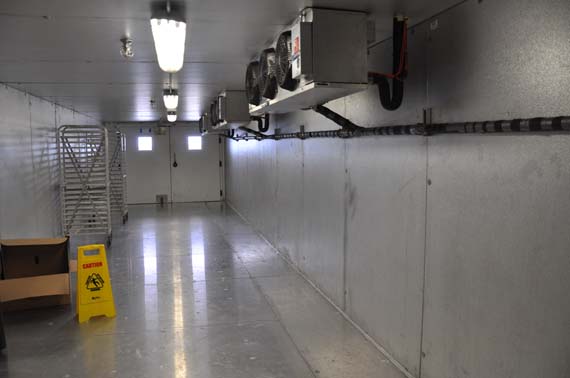 Meadowbank's giant potato fridge, waiting on the first sealift delivery of the year, can hold three months' worth of potatoes when full. (PHOTO BY SARAH ROGERS) 