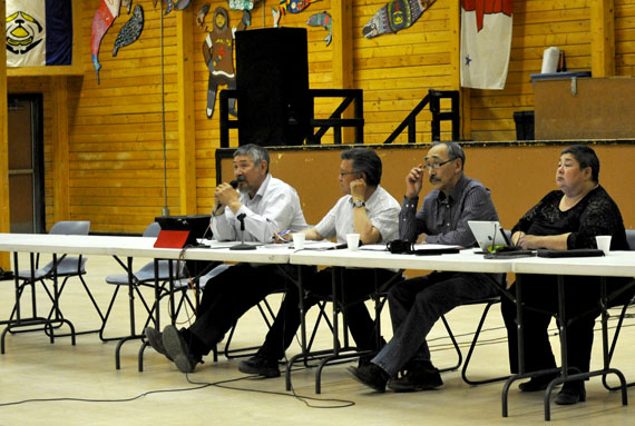 From left, Economic Development and Transport minister George Kuksuk, Community and Government Services Minister Tom Sammurtok, Education minister Paul Quassa, and Health Minister Monica Ell listen to community concerns at the Mark Kalluak hall in Arviat June 26 as part of a tour through the Kivalliq last month. (PHOTO BY ERIC ANOEE) 