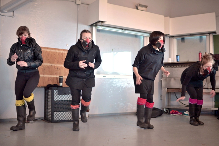 Gas masks and gum boots: inspired by Iqaluit's two-month-old dump fire, the Kasuktaqtiit dance group, in costume with breathing masks, put on an original performance as part of the Qaggiavuut Society’s first Art in the Park show, July 22, at the Sylvia Grinnell Territorial Park pavilion. Read more about Qaggiavuut and other performances at the show on nunatsiaqonline.ca. (PHOTO BY SHAWN INNUKSUK)