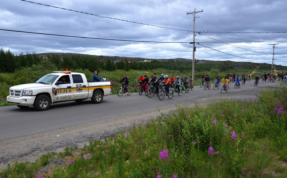 Kuujjuaq youth of all ages rode in a bike rally through the Nunavik community July 23, coordinated by the Kativik Regional Police Force's Cadet program. The annual event is held to promote bike safety. Lucky participants went home prizes like new bicycles, helmets locks and gift certificates, thanks to sponsorship from a number of regional organizations. (PHOTO BY ISABELLE DUBOIS)