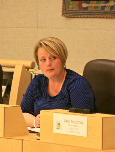 Iqaluit-Niaqunnguu MLA Pat Angnakak questions officials from Nunavut’s Department of Family Services in the legislative assembly’s standing committee hearings on child and family services Sept. 17. (PHOTO BY PETER VARGA)