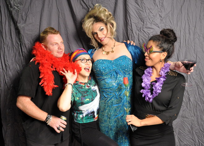Zsa Zsa LaWhore poses in a fundraising photo booth at Iqaluit Pride Sept. 27 with some avid fans. The event, held at Iqaluit's francophone centre, drew a full house for most of the night with a lineup out the door and included mesmerizing performances. Stay posted to Nunatsiaq News for a multimedia story. (PHOTO BY THOMAS ROHNER)