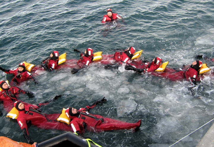 Nunavut Fisheries and Marine Training Consortium trainees practice a sea rescue exercise in the icy waters of Frobisher Bay, late in October of 2013. The group took to the water as part of their training for work in the fisheries industry. (PHOTO COURTESY OF NFMTC)