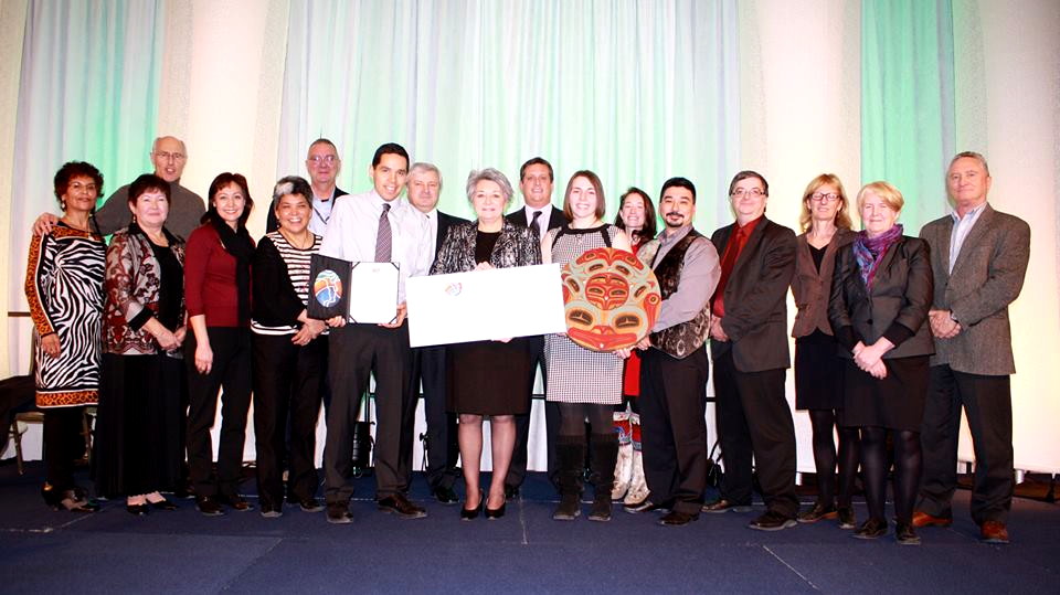 The team behind the Amaujaq National Centre for Inuit Education, with the Arctic Inspiration Prize founders and selection committee members after being awarded $325,000 in 2013. (PHOTO COURTESY OF ITK)
