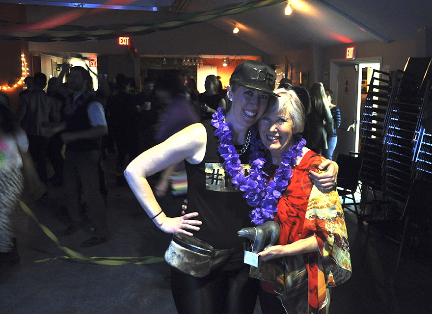 Iqaluit Pride organizer Michelle Zakrison, left, poses with the winner of the evening event's dance contest — Zakrison's mother Honora Dines. Dines took home a soapstone polar bear sculpture donated by Bryan Hellwig at Northern Collectibles. (PHOTO BY THOMAS ROHNER)