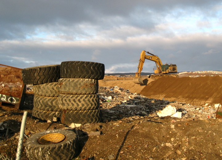 Several government agencies have raised environmental concerns over Iqaluit's water licence application which includes decommissioning the old dump, above, which burned for 122 days this summer. (PHOTO BY PETER VARGA)