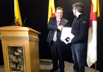 Nunavut premier Peter Taptuna congratulates Neil Christopher on his Council of the Federation literacy award Nov. 5. (PHOTO COURTESY OF NAC)
