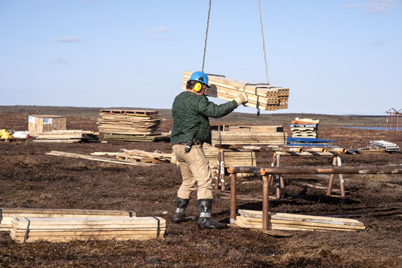An Agnico Eagle geologist unloads supplies at the company's Amaruq exploration site, where work is expected to ramp up in 2015. (AGNICO EAGLE PHOTO) 