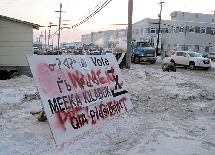 This prominent campaign sign at Iqaluit’s Four Corners for Meeka Kilabuk, candidate for president in the Qikiqtani Inuit Association’s election Dec. 8, remained in place on election day, despite some misogynistic vandalism. Vandals had scrawled the words “No Women President” and crossed out her name with red spray paint. But by lunchtime, someone had rubbed out the word