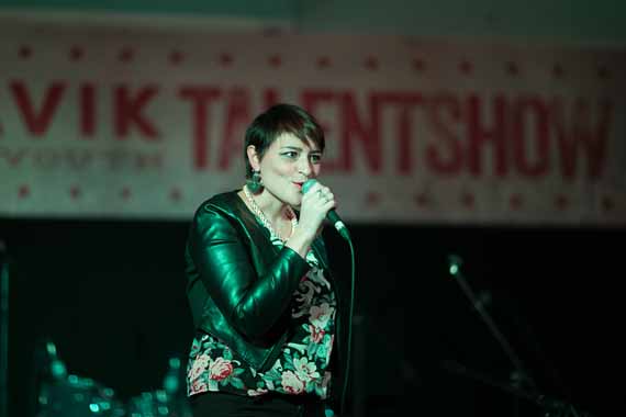 Elisapie Isaac performs for a crowd in her home town of Salluit Dec. 6 as part of the second annual Talent Show gala hosted in the Hudson Strait community. The event, which ran through the weekend, featured performances by Nunavimmiut youth from across the region as well as music workshops. See more coverage of the event this week at Nunatsiaqonline.ca. (PHOTO BY TRISTAN BRAND) 