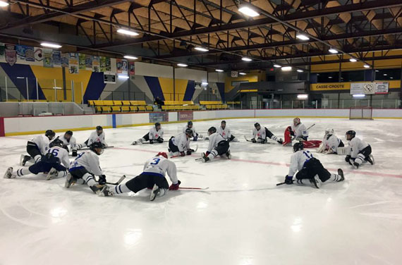 Members of the Nunavik Nordiks Midget A stretch on the ice in preparation for the start of the Donnacona provincial midget tournament, which kicked off Jan. 9 outside of Quebec City. The Midget A team, made up of players from across the region under the Nunavik Youth Hockey Development Program , hopes to defend its 2014 championship title. Nunavimmiut can follow the action on its regional radio broadcaster, Taqramiut Nipingat Inc. (PHOTO COURTESY OF NYHDP)