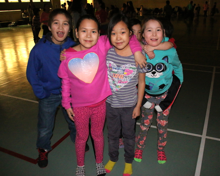 Get into the groove: the Cambridge Bay junior boys basketball team hosted a teen dance Jan. 16 to help raise money for an upcoming tournament in Yellowknife. More than 150 young people showed up to dance and hang out with their friends including, from left, Nathan Maksagak, Angel Kaosoni, Megan Tologanak and Jenny Kaiyogana. (PHOTO BY KELCEY WRIGHT)