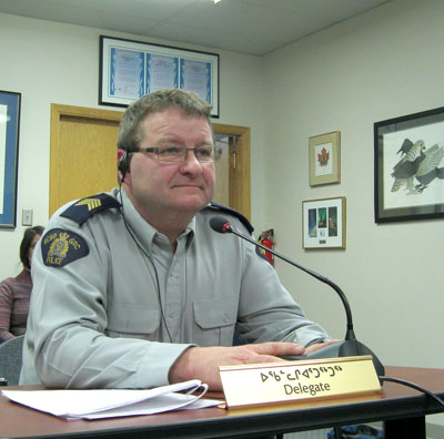 Staff Sgt. Monty LeComte of the RCMP’s Iqaluit detachment takes city councillors’ questions and listens to their concerns about the community’s recent rash of robberies at convenience stores throughout the city. Police have solved five of six incidents that took place Oct. 27 to Feb. 17. (PHOTO BY PETER VARGA)

