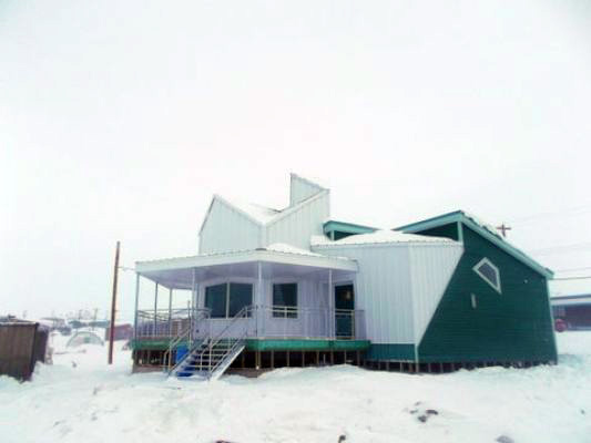 Qikiqtarjuaq's new iceberg-shaped Gathering House will house the community's new interpretive and cultural display. (PHOTO COURTESY OF NCC INVESTMENTS INC) 
