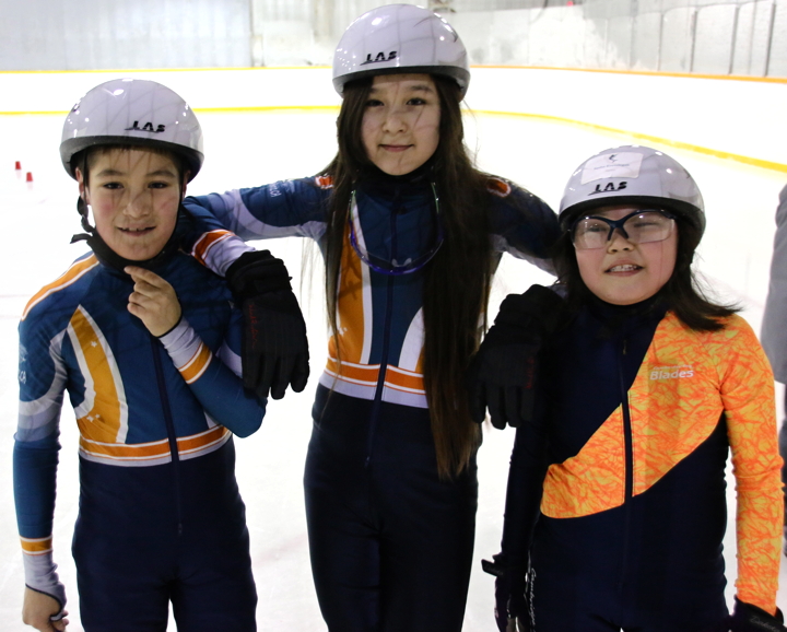 After months of practicing with coach Ruth Roberts, Cambridge Bay speed skaters Nathan Maksagak, left, Joyce Evetalegak, centre, and Sasha Evetalegak are psyched up and ready to head to Yellowknife for the 2015 Speed Skating Territorials which take place this weekend. Other members of the team not pictured are Nykesha and Peyton Dyer-Aknavigak. (PHOTO BY KELCEY WRIGHT)